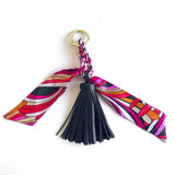 Bag charm tassel with twilly scarf design in Black with a magenta scarf