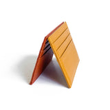 Flat leather card holder in Mustard Yellow and Clementine Orange, thin and practical 