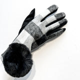 Fashionable and affordable design gloves with black and white tartan pattern and black faux-fur worn